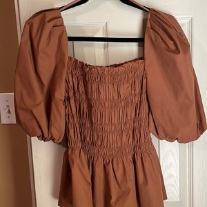 Rust peplum top